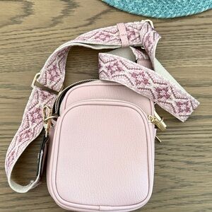Elegant Pink Crossbody Bag with Patterned Strap